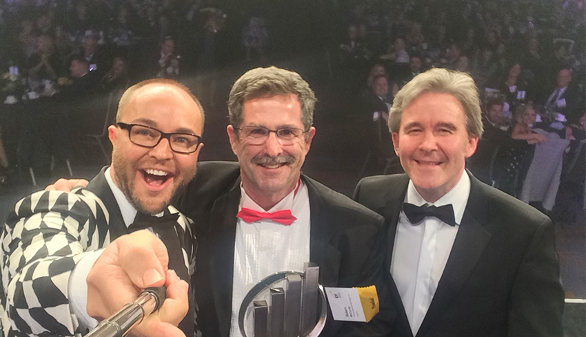 Eminence Organics President Boldijarre Koronczay on stage at the Ernst & Young Entrepreneur of the Year awards ceremony.